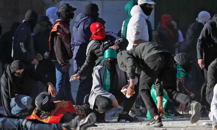 Palestinian protesters during fighting with Israeli security forces on Friday morning.