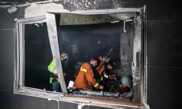 Gaza: at least 21 people die as fire breaks out at party in residential  block | Gaza | The Guardian