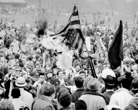 Anti-Vietnam war demonstrators burn the flag in Central Park, 1967.