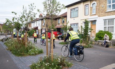 Cyclists pass through a closure in Grove Road