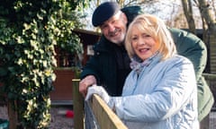 Alison Steadman and Larry Lamb pictured together at a garden fence.
