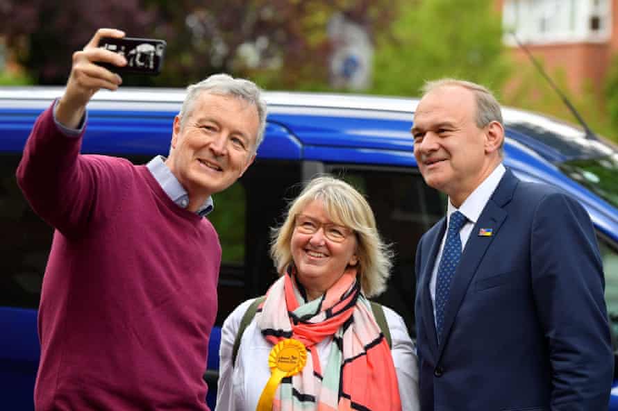 Ed Davey, the Lib Dem leader (right), posing for a picture after casting his vote in London