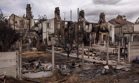 Gutted homes after a wildfire in July 2022 in Wennington, east London.