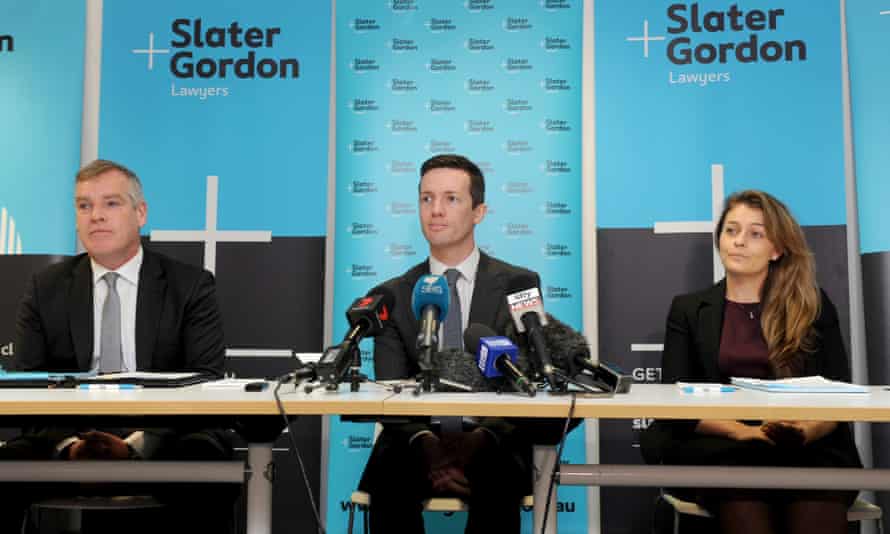 Slater and Gordon Lawyers Rory Walsh, Andrew Baker and Ebony Birchall at a media conference at the firm’s Melbourne offices on Wednesday 14 June .