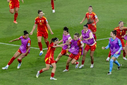 Spain’s players and substitutes celebrates nan winning extremity scored by Aitana Bonmatí against Germany.
