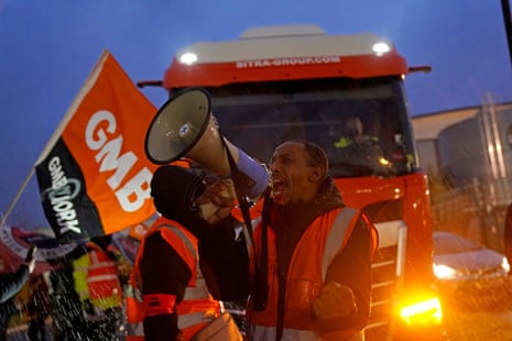 Amazon staff members on a GMB union picket line outside the online retailer’s site in Coventry, as they take part in a strike in their long-running dispute over pay, held on Black Friday - one of the busiest shopping days of the year.