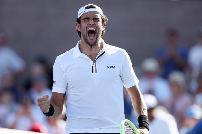 Matteo Berrettini celebrates after beating Hugo Grenier.