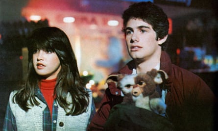 ‘He’s in love with her already!’ … Phoebe Cates and Zach Galligan with Gizmo.