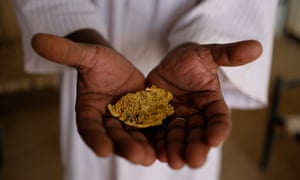 Salahuddein Salah, site manager of the El-Etimad mine, displays gold derived through the mercury and cyanide process.