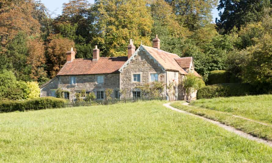 Driveway leading to large detached country house at Bowden Hill, near Lacock, Wiltshire.