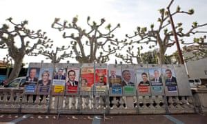 Campaign posters of the 11 candidates who run in the 2017 French presidential election.