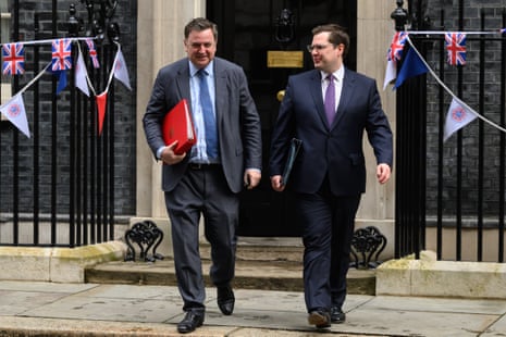 Mel Stride (left), the work and pensions secretary, and Robert Jenrick, the immigration minister, leaving No 10 after cabinet this morning.