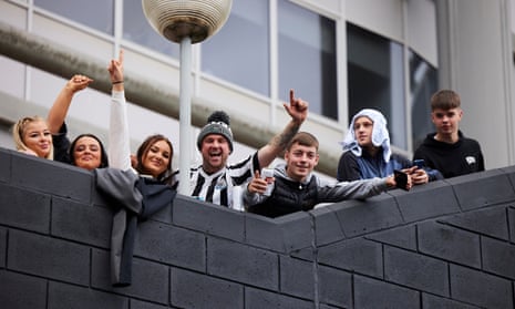 Newcastle fans celebrate outside St James’ Park