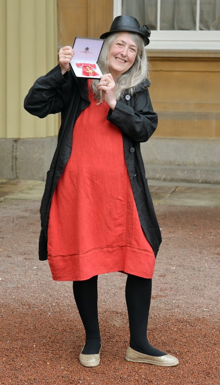Mary Beard with her OBE medal in 2013.