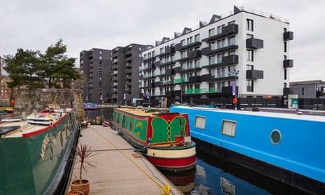 Canal boats on the New Islington marina in Ancoats, Manchester.