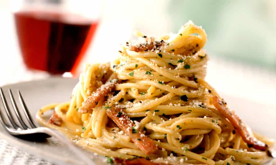 A plate of pasta carbonara