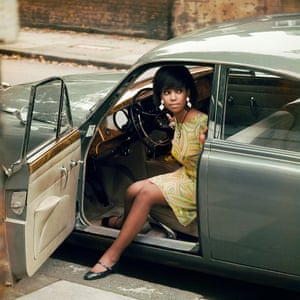Drum screen miss Erlin Ibreck stepping retired of a Jaguar successful Kilburn, London, 1966