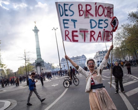 A protester wearing a French Revolution era-themed costume during a 2023 protest against pushing pensions reform through parliament without a vote.