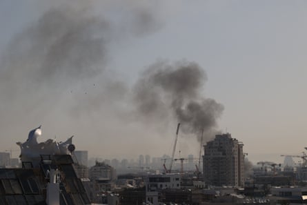 Smoke rises from the Iranian missile strike in Tel Aviv