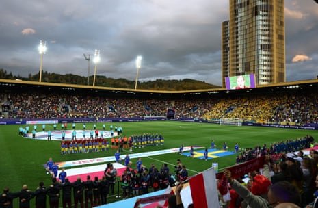 The Poland and Sweden players line up before the match.