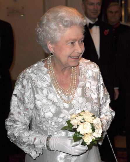 The queen wearing pearls at the Royal Opera House in 2012.