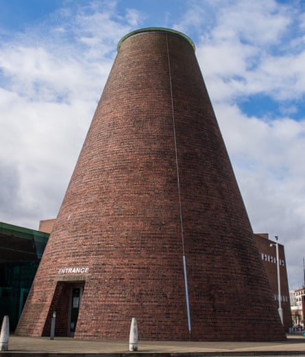 A cone-shaped brick tower with a flat top