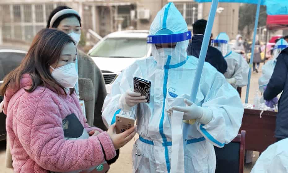 Residents in line up for Covid tests in Anyang, where the Omicron variant has been detected.