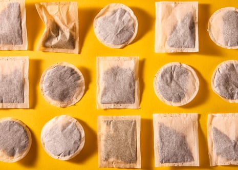Teabags arranged in a pattern on yellow background