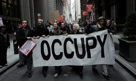 Protesters take part in an Occupy Wall Street rally near the New York Stock Exchange in November 2011