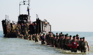 A beach landing by the Royal Marines of 47 Commando at Asnelles before their annual 'yomp' to Port-en-Bessin, in Normandy, France