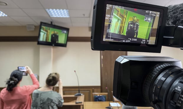 Alexei Navalny appears via videolink in a courtroom in Vladimir, Russia
