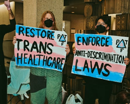 PTF signs at a protest.