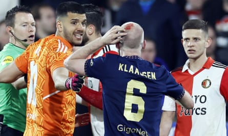 Davy Klaassen reacts after being hit by an object thrown by a Feyenoord fan during their KNVB Cup semi-final in Rotterdam in April 2023.