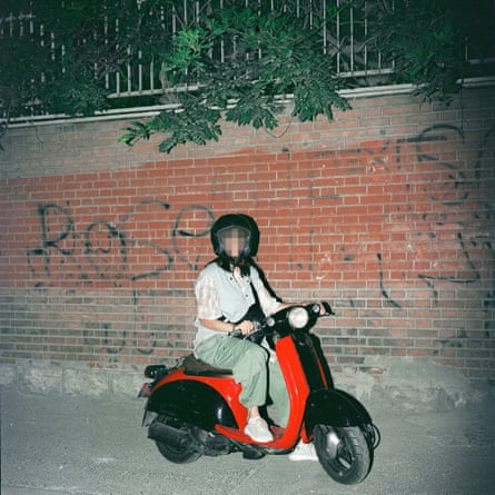 A woman on a motorbike