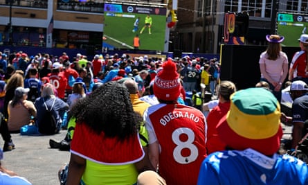 Fans watch a live broadcast of Premier League Morning Live in Nashville, Tennessee.
