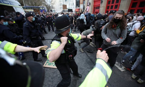 Police and protesters in Bristol on 21 March 2021.