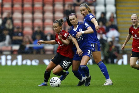 Julia Zigiotti Olme holds off the Leicester players