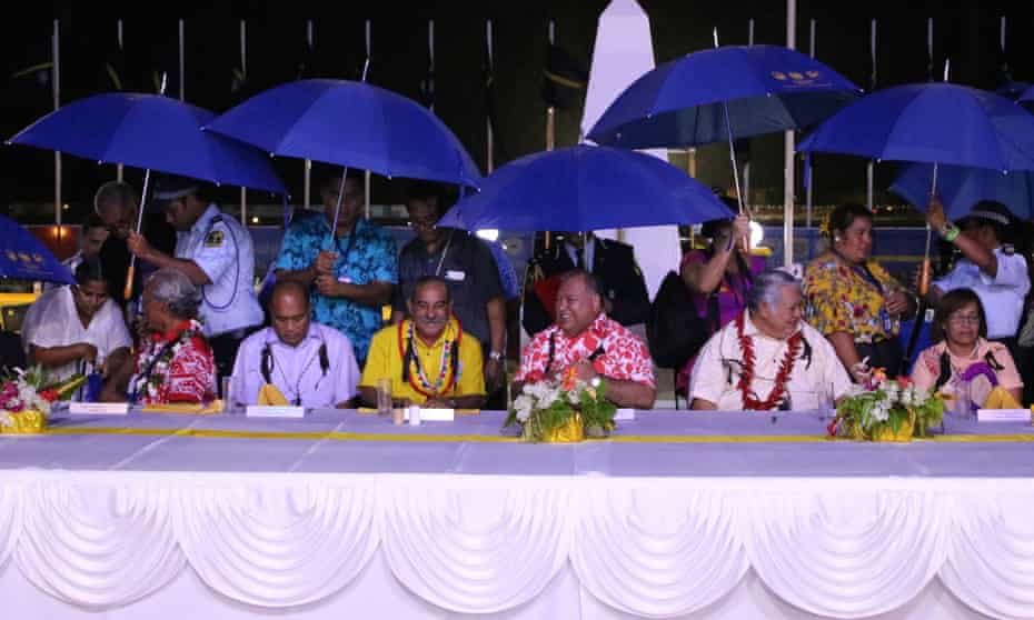 Leaders, including Nauru President Baron Waqa (centre in red shirt) at the opening ceremony of the Pacific Islands Forum in Yaren on Monday. 