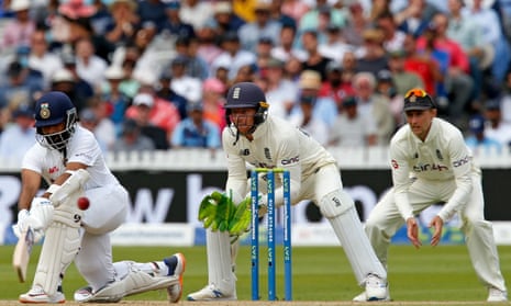 India’s Ajinkya Rahane (L) sweeps the ball for four as England’s Jos Buttler (C) keeps wicket and England’s captain Joe Root (R) stands in the slips