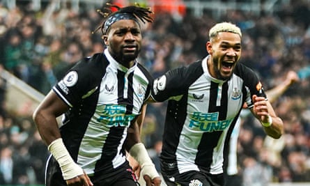 Allan Saint-Maximin, left, celebrates with Joelinton after scoring for Newcastle on seven minutes.