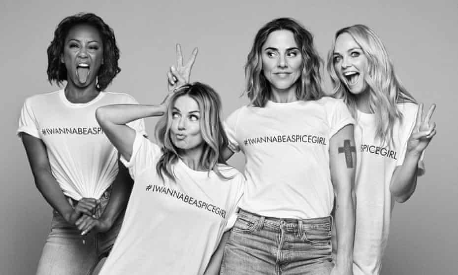 Members of the Spice Girls wearing #IWannaBeASpiceGirl T-shirts