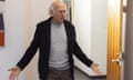 Larry David of Curb Your Enthusiasm wearing a crew-neck jumper and blazer