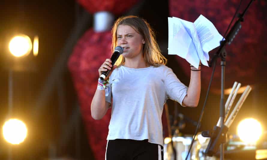 Greta Thunberg speaking on stage on Saturday.