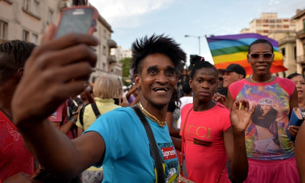 People take part in the gay pride parade in Havana