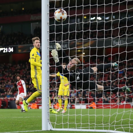 Mohamed Elneny shoots the ball past Bate keeper Denis Shcherbitski for Arsenal’s sixth.