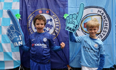 Young fans by a merchandise stall on Wembley Way.