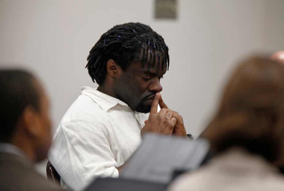 Death row inmate Marcus Robinson listens in court.