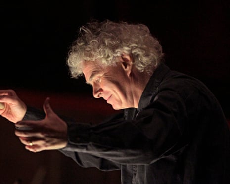In this Dec. 8, 2010 photo provided by the Metropolitan Opera, Sir Simon Rattle conducts the rehearsal of Debussy s "Pell as et M lisande" at the Metropolitan Opera in New York. (AP Photo/Metropolitan Opera, Ken Howard) NO SALES