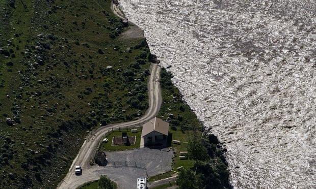 America’s summer of floods: climate crisis fueling barrage, scientists say 1 A road ends where flood waters washed away a house in Gardiner, Montana, in June.