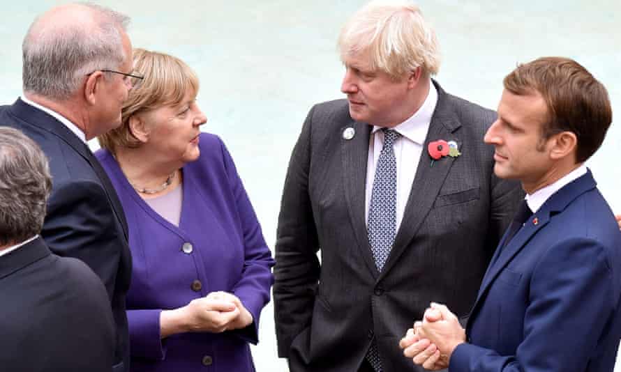 Scott Morrison with German chancellor Angela Merkel, UK prime minister Boris Johnson and French president Emmanuel Macron at the Trevi fountain in Rome on the sidelines of the G20 summit.